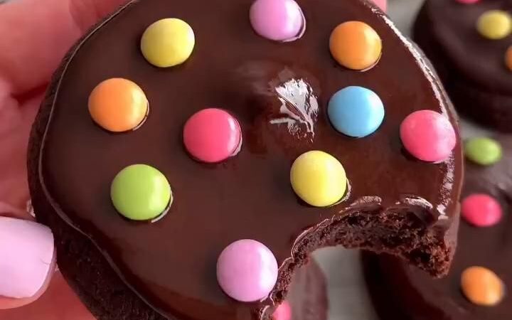 chocolate cookies with colorful toppings